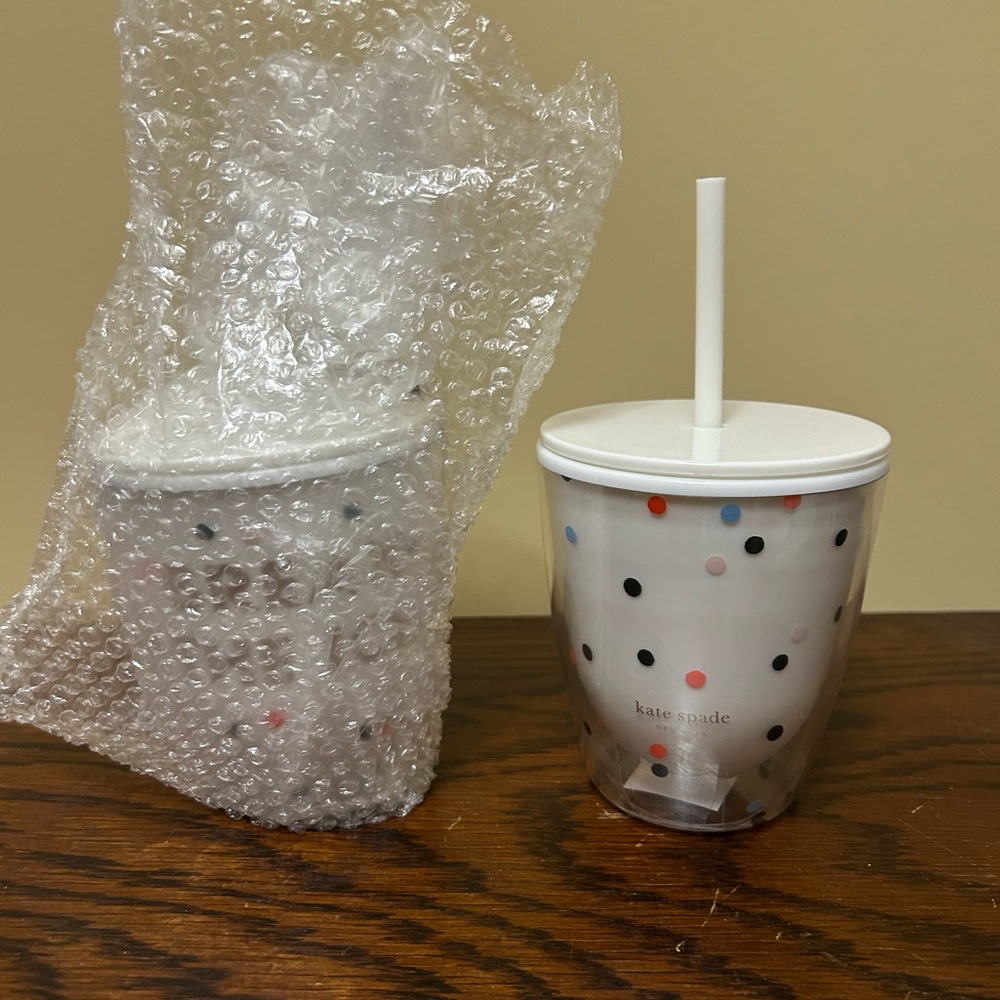 Kate Spade ♠️ a pair of small insulated cups with lid and straw.